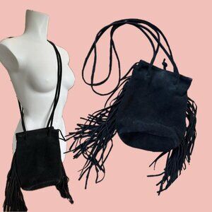 High-quality genuine suede handbag with dramatic fringe details